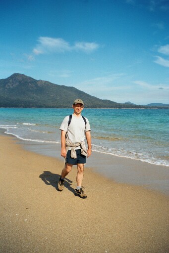 Nathan striding out across Wine Glass Bay
