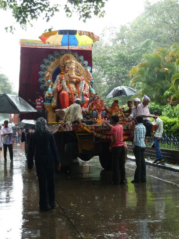 Ganesh on the way to immersion, complete with rave music!