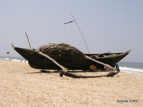 Recently returned fishing boat on Benualim Beach