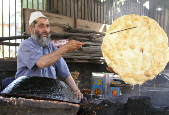 A giant paratha dripping with fat