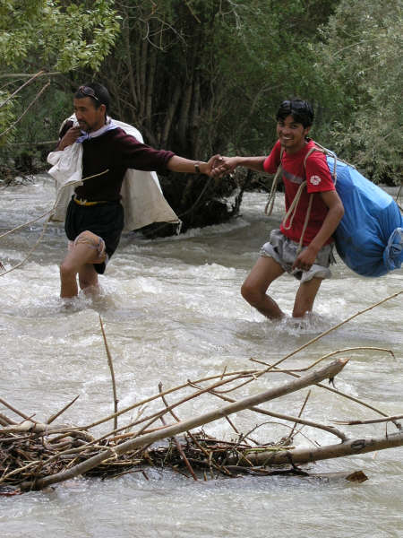 Lama-ji and Tashi crossing where once there had been a road