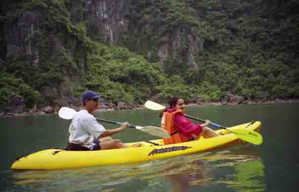 Sue canoeing in Halong Bay with Thanh, our guide