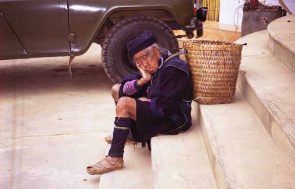 A Black Hmong lady after too much rice wine at the weekend market