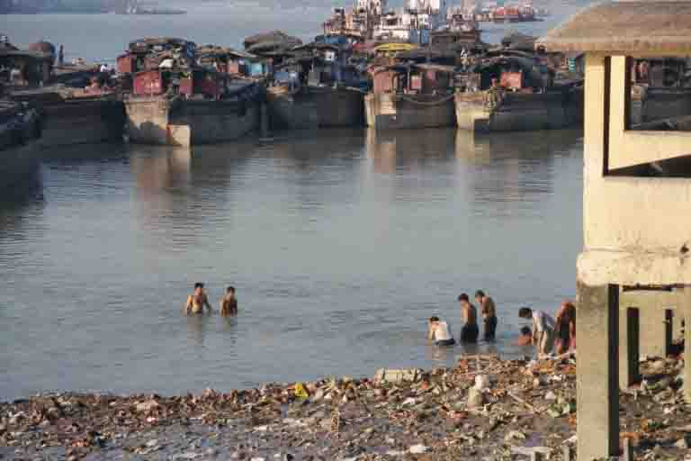 We refrained from joining these men bathing in the Hooghly River, Calcutta